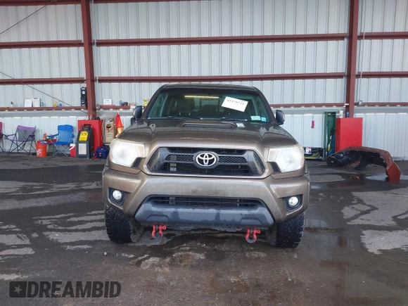 2014 Toyota Tacoma with VIN 3TMMU4FN4EM072128, listed as a IAAI auction lot 42479725 with 287,877 mi miles and . Bid and sale history available at DreamBid. Image 12.