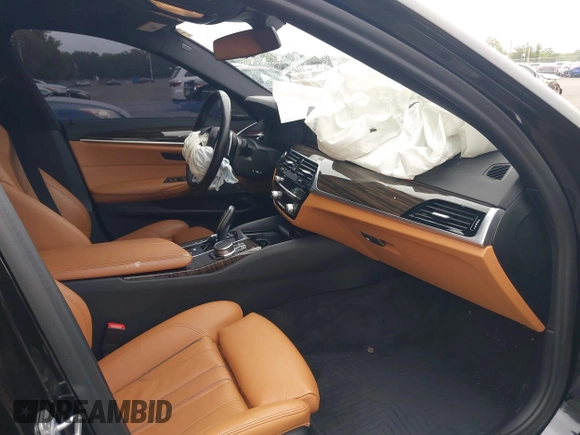 2020 BMW 5 Series 540i xDrive z VIN WBAJS3C09LCD33702, wystawiony jako IAAI lot #42504307 z przebiegiem 79 099 mil mil oraz . Historia ofert i sprzedaży dostępna na DreamBid. Obrazek 5.