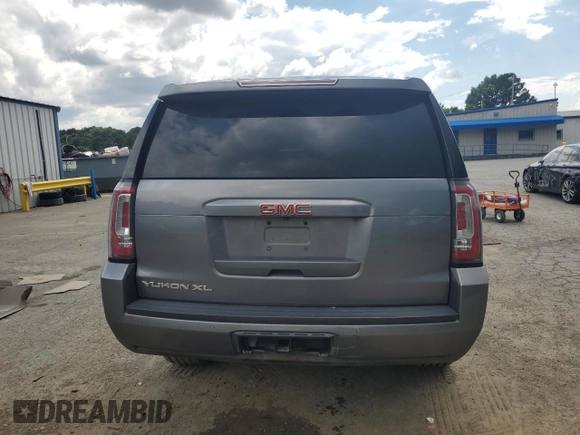 2019 GMC Yukon XL SLT z VIN 1GKS1GKC0KR325305, wystawiony jako Copart lot #56219325 z przebiegiem 136 295 mil mil oraz Szkoda całkowita • Salvage title. Historia ofert i sprzedaży dostępna na DreamBid. Obrazek 6.