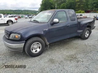 2000 Ford F-150 with VIN 2FTZX072XYCA46434, listed as a Copart auction lot 57024875 with 339,875 mi miles and Salvage title. Bid and sale history available at DreamBid. Image 1.