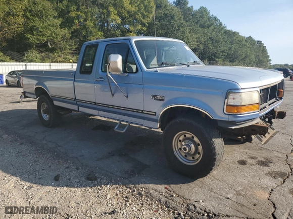 1996 Ford F-250 HD with VIN 1FTHX26G4TEB59478, listed as a Copart auction lot 75983344 with 132,504 mi miles and Salvage Title. Bid and sale history available at carsss.com. Image 4.