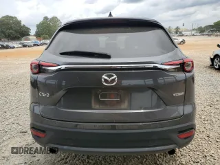 2020 Mazda CX-9 Touring z VIN JM3TCACY3L0411822, wystawiony jako Copart lot #60323295 z przebiegiem 61 348 mil mil oraz Szkoda całkowita • Salvage title. Historia ofert i sprzedaży dostępna na DreamBid. Obrazek 6.