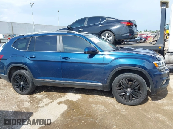 2018 Volkswagen Atlas SEL z VIN 1V2MR2CA4JC512804, wystawiony jako IAAI lot #42528402 z przebiegiem 59 226 mil mil oraz . Historia ofert i sprzedaży dostępna na DreamBid. Obrazek 13.