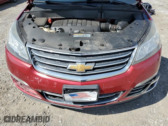 2014 Chevrolet Traverse LTZ z VIN 1GNKVJKD8EJ324323, wystawiony jako Copart lot #51430325 z przebiegiem 141 209 mil mil oraz Szkoda całkowita • Salvage title. Historia ofert i sprzedaży dostępna na DreamBid. Obrazek 13.