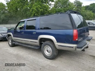 1999 GMC Suburban z VIN 1GKGK26J6XJ771768, wystawiony jako Copart lot #66300974 z przebiegiem 181 048 mil mil oraz Szkody całkowita. Historia ofert i sprzedaży dostępna na DreamBid. Obrazek 2.