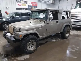 2006 Jeep Wrangler Unlimited LWB with VIN 1J4FA44S96P714309, listed as a IAAI auction lot 41252391 with 164,720 mi miles. Bid and sale history available at carsss.com. Image 2.
