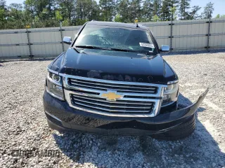 2018 Chevrolet Suburban Premier with VIN 1GNSCJKC1JR199271, listed as a Copart auction lot 52395935 with 216,083 mi miles and Salvage Title. Bid and sale history available at DreamBid. Image 5.