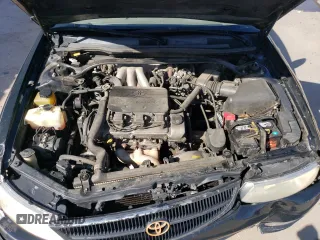 2000 Toyota Solara SE z VIN 2T1CF22P9YC364050, wystawiony jako Copart lot #56972195 z przebiegiem 178 229 mil mil oraz Szkoda całkowita • Salvage title. Historia ofert i sprzedaży dostępna na DreamBid. Obrazek 11.