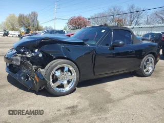 2003 Mazda MX-5 Miata Cloth z VIN JM1NB353830303973, wystawiony jako Copart lot #53244715 z przebiegiem 50 189 mil mil oraz Szkoda całkowita • Salvage title. Historia ofert i sprzedaży dostępna na DreamBid. Obrazek 1.