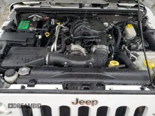 2013 Jeep Wrangler Unlimited Sahara with VIN 1C4HJWEG4DL562951, listed as a Copart auction lot 58001475 with 95,744 mi miles and Clean title. Bid and sale history available at DreamBid. Image 11.