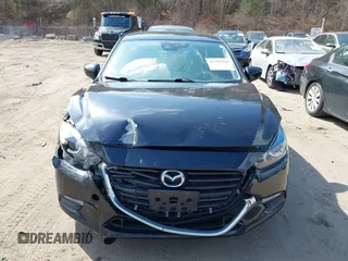 2018 Mazda 3 Touring with VIN 3MZBN1V34JM261565, listed as a IAAI auction lot 41795238 with 121,112 mi miles. Bid and sale history available at carsss.com. Image 13.