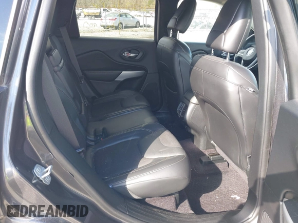 2018 Jeep Cherokee Latitude Plus with VIN 1C4PJLLXXJD606504, listed as a IAAI auction lot 41731085 with 95,569 mi miles. Bid and sale history available at carsss.com. Image 8.