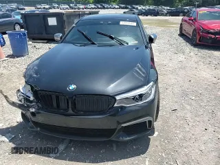 2019 BMW 5 Series M550i xDrive with VIN WBAJB9C53KB289356, listed as a Copart auction lot 57814535 with 60,454 mi miles and Clean title. Bid and sale history available at DreamBid. Image 14.