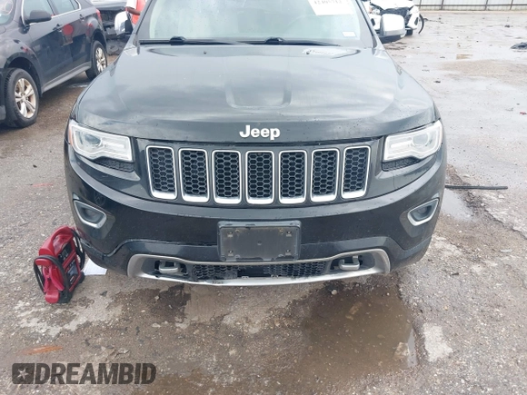 2015 Jeep Grand Cherokee Overland with VIN 1C4RJECG1FC769950, listed as a IAAI auction lot 42405712 with 217,514 mi miles and . Bid and sale history available at DreamBid. Image 12.