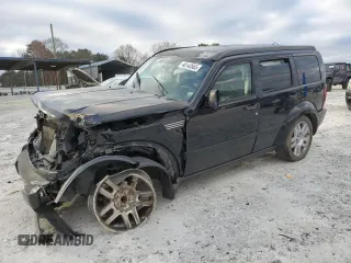2007 Dodge Nitro R/T z VIN 1D8GT58697W677391, wystawiony jako Copart lot #46142865 z przebiegiem 193 050 mil mil oraz Szkoda całkowita • Salvage title. Historia ofert i sprzedaży dostępna na DreamBid. Obrazek 1.
