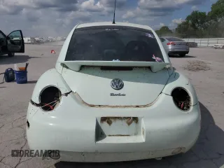 2001 Volkswagen Beetle GLS z VIN 3VWCD21C51M447957, wystawiony jako Copart lot #59517765 z przebiegiem 145 484 mil mil oraz Szkoda całkowita • Salvage title. Historia ofert i sprzedaży dostępna na DreamBid. Obrazek 6.