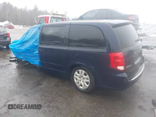 2016 Dodge Grand Caravan SE with VIN 2C4RDGBG3GR258639, listed as a IAAI auction lot 41687082 with 99,616 mi miles and . Bid and sale history available at DreamBid. Image 3.
