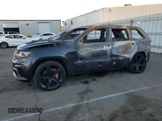 2012 Jeep Grand Cherokee SRT8 with VIN 1C4RJFDJ1CC311983, listed as a Copart auction lot 87966635 with 0 mi miles and Non Repairable. Bid and sale history available at carsss.com. Image 1.