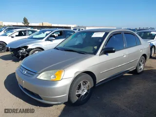 2003 Honda Civic LX with VIN 2HGES16563H521654, listed as a IAAI auction lot 42094679 with 157,031 mi miles. Bid and sale history available at carsss.com. Image 6.