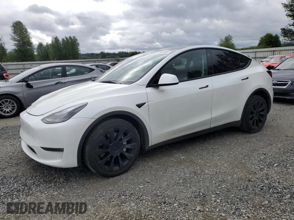 2023 Tesla Model Y Long Range z VIN 7SAYGDEE3PF751019, wystawiony jako Copart lot #57972885 z przebiegiem 24 591 mil mil oraz Szkoda całkowita • Salvage title. Historia ofert i sprzedaży dostępna na DreamBid. Obrazek 1.