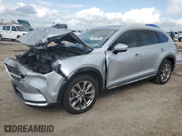 2016 Mazda CX-9 Signature with VIN JM3TCBEY1G0121667, listed as a Copart auction lot 54974805 with Not provided miles and Salvage title. Bid and sale history available at DreamBid. Image 1.