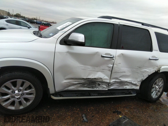 2015 Toyota Sequoia Platinum with VIN 5TDDW5G1XFS119997, listed as a IAAI auction lot 41344111 with 232,028 mi miles and . Bid and sale history available at DreamBid. Image 14.