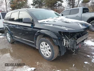 2014 Dodge Journey American Value Pkg with VIN 3C4PDCAB4ET283985, listed as a IAAI auction lot 41617089 with 155,860 mi miles. Bid and sale history available at carsss.com. Image 1.