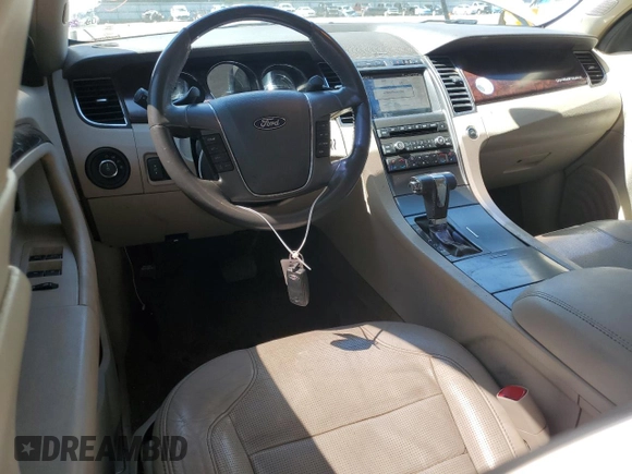 2011 Ford Taurus Limited with VIN 1FAHP2FW8BG141839, listed as a Copart auction lot 56594285 with 121,236 mi miles and Salvage title. Bid and sale history available at DreamBid. Image 8.