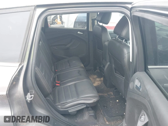 2014 Ford Escape Titanium with VIN 1FMCU0JX2EUA28679, listed as a IAAI auction lot 41930585 with 164,038 mi miles. Bid and sale history available at carsss.com. Image 8.