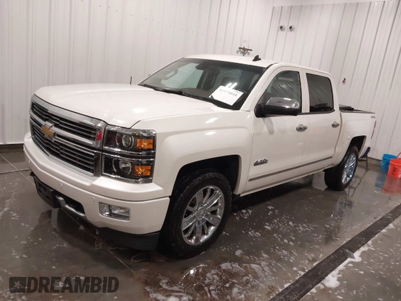 2014 Chevrolet Silverado 1500 High Country with VIN 3GCUKTEC4EG527722, listed as a IAAI auction lot 41978841 with 104,492 mi miles and . Bid and sale history available at DreamBid. Image 22.