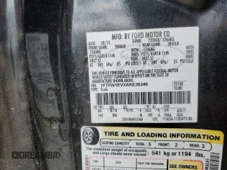 2010 Ford F-150 XL with VIN 1FTFW1EVXAKE36346, listed as a Copart auction lot 52574855 with 187,635 mi miles and Salvage Title. Bid and sale history available at DreamBid. Image 12.