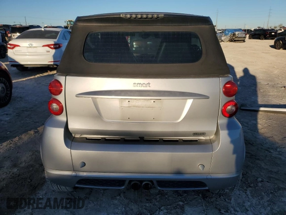 2009 Smart fortwo Passion z VIN WMEEK31X19K281791, wystawiony jako Copart lot #81420034 z przebiegiem 72 965 mil mil oraz Szkoda całkowita • Salvage title. Historia ofert i sprzedaży dostępna na DreamBid. Obrazek 6.
