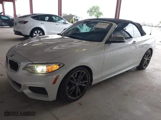 2015 BMW 2 Series M235i with VIN WBA1M1C53FV393300, listed as a IAAI auction lot 41926019 with 180,949 mi miles. Bid and sale history available at carsss.com. Image 2.