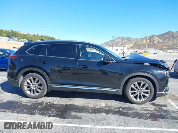 2018 Mazda CX-9 Grand Touring z VIN JM3TCADY8J0221221, wystawiony jako IAAI lot #41644721 z przebiegiem 41 510 mil mil oraz . Historia ofert i sprzedaży dostępna na DreamBid. Obrazek 13.