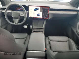 2023 Tesla Model X with VIN 7SAXCDE50PF430739, listed as a Copart auction lot 43069745 with 13,942 mi miles and Salvage Title. Bid and sale history available at DreamBid. Image 8.