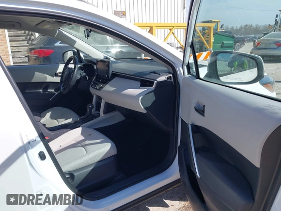 2022 Toyota Corolla Cross LE with VIN 7MUCAABG7NV013235, listed as a IAAI auction lot 41796408 with 20,943 mi miles and . Bid and sale history available at DreamBid. Image 5.
