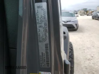 2020 Jeep Wrangler Unlimited Sport Altitude with VIN 1C4HJXDG2LW325430, listed as a Copart auction lot 46953185 with 69,919 mi miles and Salvage title. Bid and sale history available at DreamBid. Image 14.