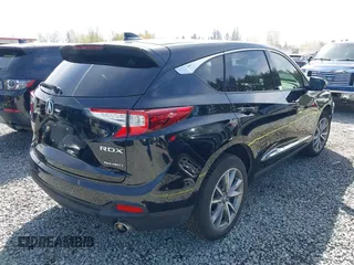 2021 Acura RDX w/Technology Package with VIN 5J8TC2H55ML006429, listed as a IAAI auction lot 42030813 with 42,712 mi miles. Bid and sale history available at carsss.com. Image 4.