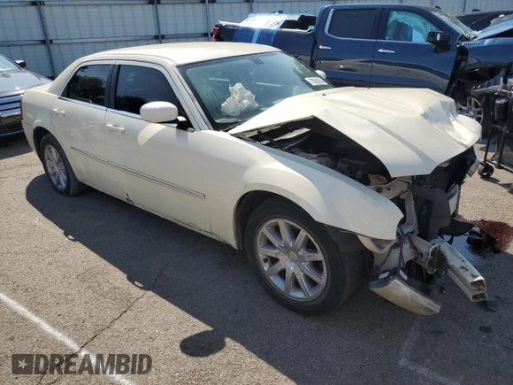 2009 Chrysler 300 Touring with VIN 2C3LA53V69H553621, listed as a Copart auction lot 70569634 with 141,157 mi miles and Salvage Title. Bid and sale history available at carsss.com. Image 4.