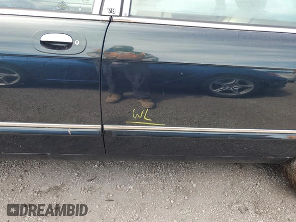 1999 Jaguar XJ with VIN SAJKX6047XC861227, listed as a Copart auction lot 75007414 with Not provided miles and Salvage title. Bid and sale history available at DreamBid. Image 12.