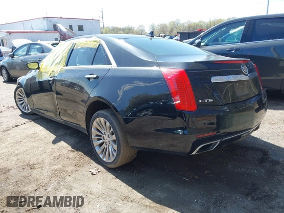 2014 Cadillac CTS Luxury RWD with VIN 1G6AR5SX4E0165254, listed as a IAAI auction lot 41938674 with 54,470 mi miles. Bid and sale history available at carsss.com. Image 3.