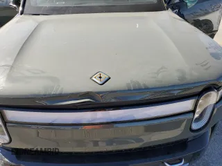 2022 Rivian R1S Launch Edition z VIN 7PDSGABL6NN000590, wystawiony jako Copart lot #61510904 z przebiegiem Nie podano mil oraz Szkody całkowita. Historia ofert i sprzedaży dostępna na DreamBid. Obrazek 12.