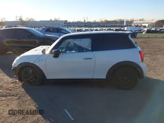 2020 MINI Hardtop Cooper S z VIN WMWXR5C00L2L49498, wystawiony jako IAAI lot #40679562 z przebiegiem 48 387 mil mil oraz . Historia ofert i sprzedaży dostępna na DreamBid. Obrazek 14.