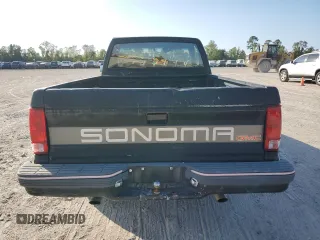 1991 GMC Sonoma with VIN 1GTCS14RXM2559524, listed as a Copart auction lot 79871374 with 228,691 mi miles and Salvage Title. Bid and sale history available at DreamBid. Image 11.