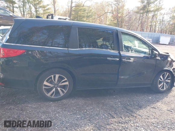 2024 Honda Odyssey Touring z VIN 5FNRL6H89RB042354, wystawiony jako IAAI lot #41469495 z przebiegiem 8 477 mil mil oraz . Historia ofert i sprzedaży dostępna na DreamBid. Obrazek 13.