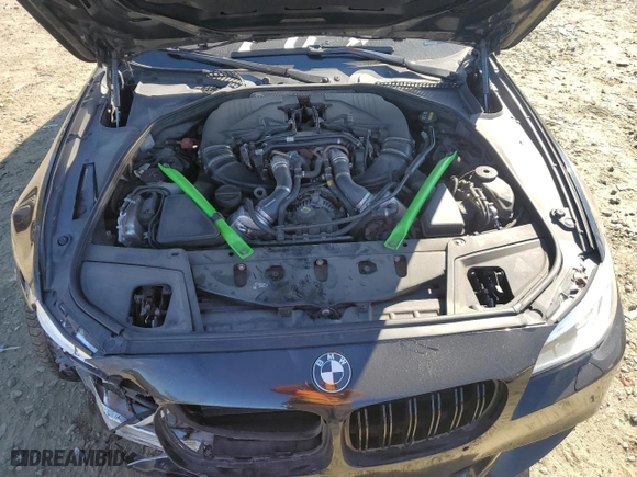 2016 BMW 5 Series 550i xDrive with VIN WBAKP9C58GG587806, listed as a Copart auction lot 76317094 with 127,918 mi miles and Salvage Title. Bid and sale history available at carsss.com. Image 12.