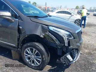 2020 Cadillac XT5 Premium Luxury FWD with VIN 1GYKNCRS0LZ220006, listed as a IAAI auction lot 41985265 with 47,464 mi miles and . Bid and sale history available at carsss.com. Image 6.