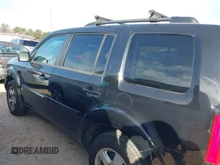 2011 Honda Pilot EX-L with VIN 5FNYF4H65BB053914, listed as a IAAI auction lot 41599171 with 230,186 mi miles and . Bid and sale history available at carsss.com. Image 14.