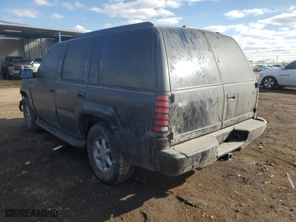 1999 GMC Denali with VIN 1GKEK13R1XR914199, listed as a Copart auction lot 46247985 with 143,628 mi miles and Salvage Title. Bid and sale history available at carsss.com. Image 2.