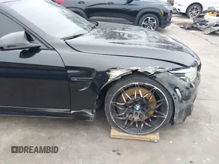2019 BMW M4 with VIN WBS4Y9C53KAH82910, listed as a IAAI auction lot 41570315 with 59,227 mi miles. Bid and sale history available at carsss.com. Image 6.